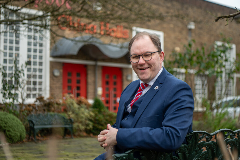 Gareth Snell MP sat on a bench outside of the Spode factory